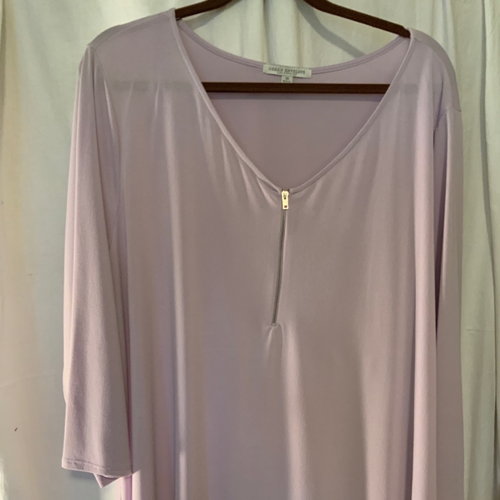 Lovely lilac color top. V neck with zipper.wonderful drape.wash not worn.